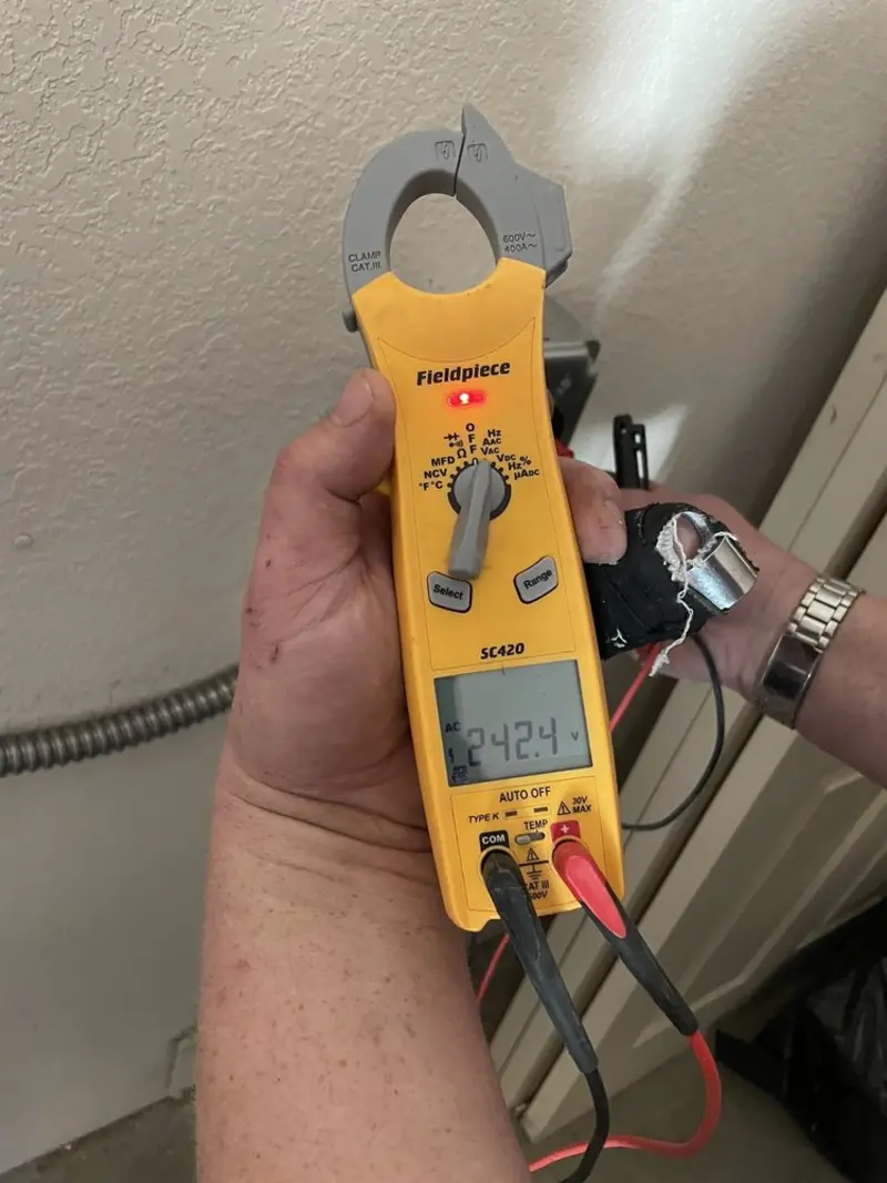 Voltage testing with clamp meter during Generator Installation in SeaTac
